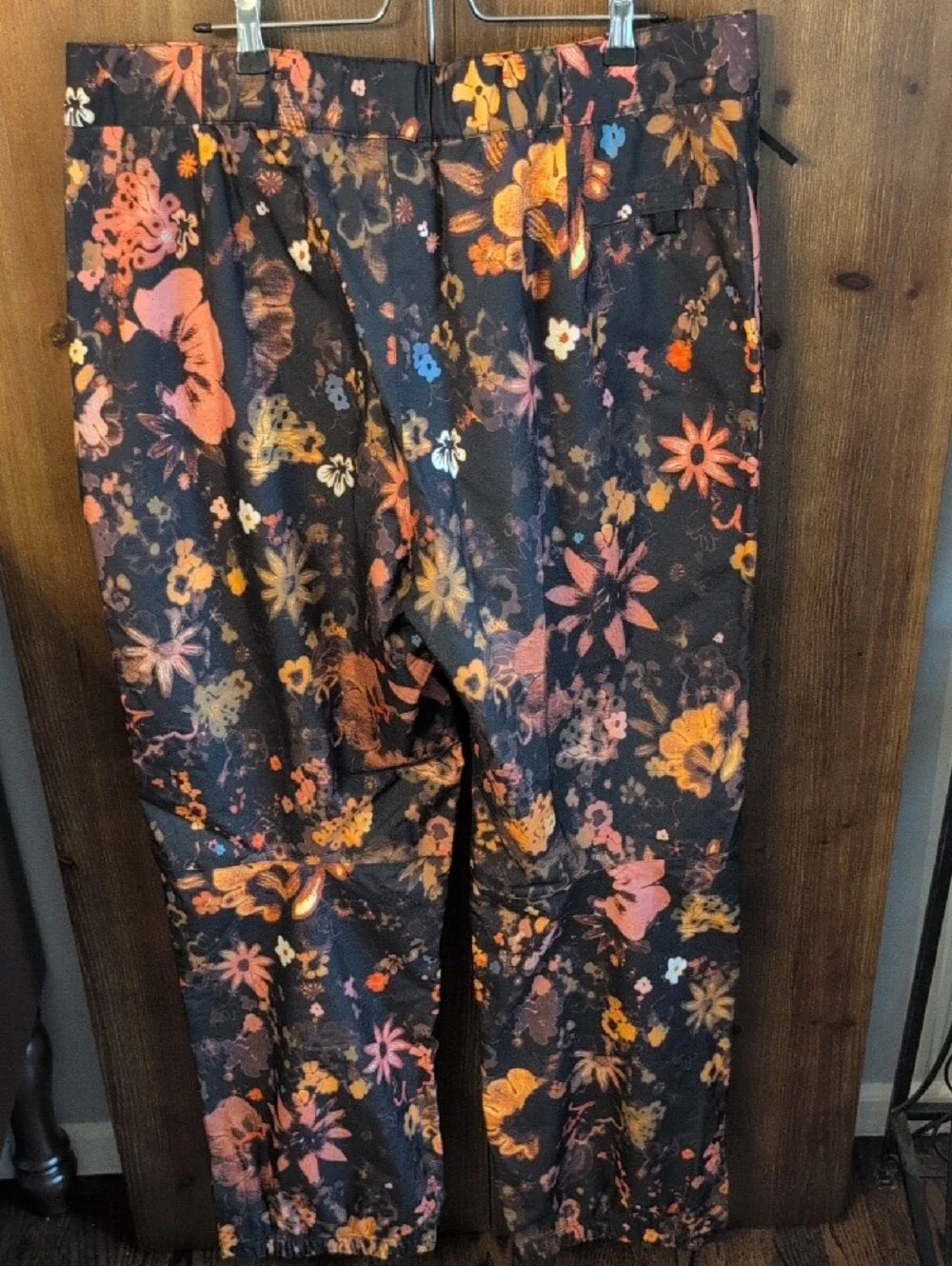 The North Face Black Floral Men's Snow Pants with Orange and Pink Accents